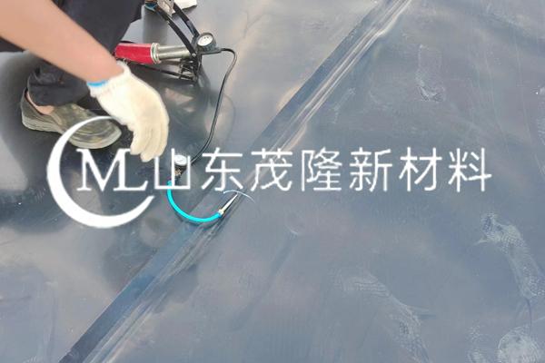 《日照嵐崗橋港口集團(tuán)有限公司項(xiàng)目》土工膜施工